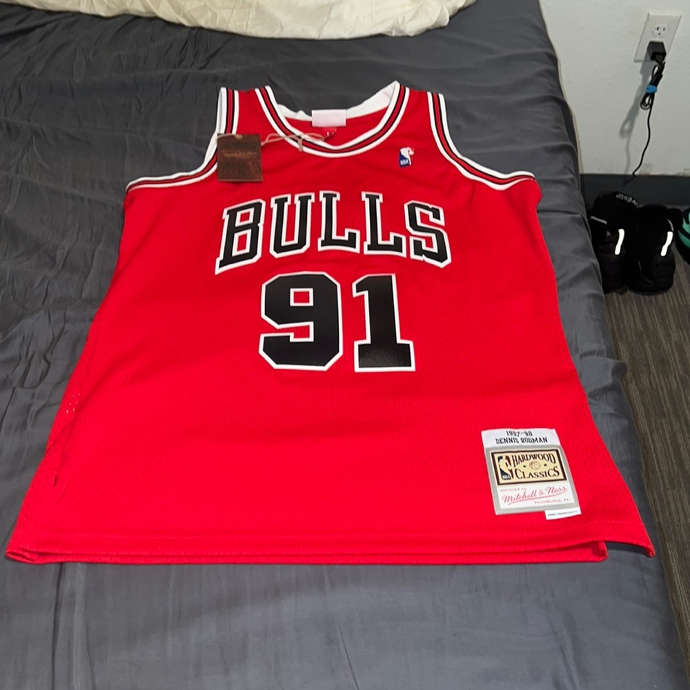 Brand new Retro Chicago Bulls Dennis Rodman jersey. Size L.